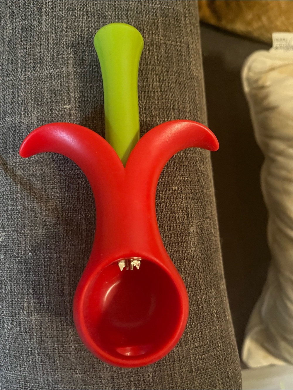 Red and Lime Green Plastic Fruit Tool